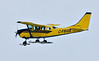 SmugMug > all-time keyword > bushland > Bushland Airways Cessna U206 C-FBGB over the Moose River at Moosonee, Ontario 2009 April 20, cropped image.